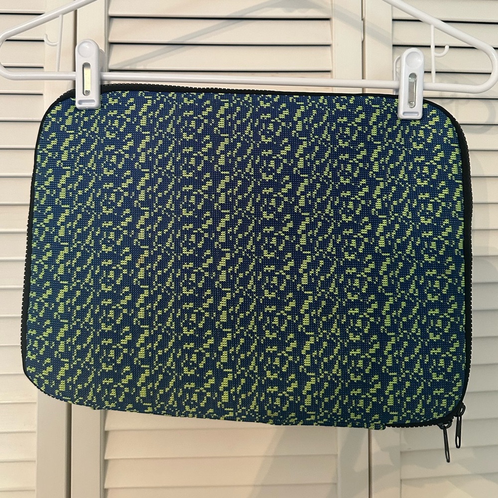 This is ‘Pixel Marble Case Macbook Pro 13 Zip Pouch’ from UO.